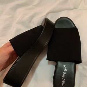 Steve Madden black platform slip ons